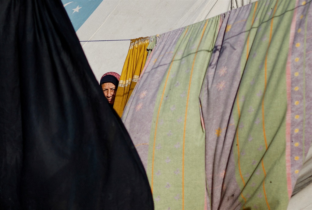 A displaced Palestinian woman, who fled her house 