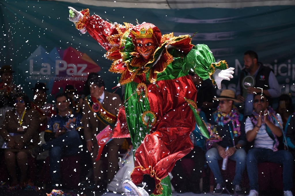 A man dressed as Pepino, a carnival character, dan