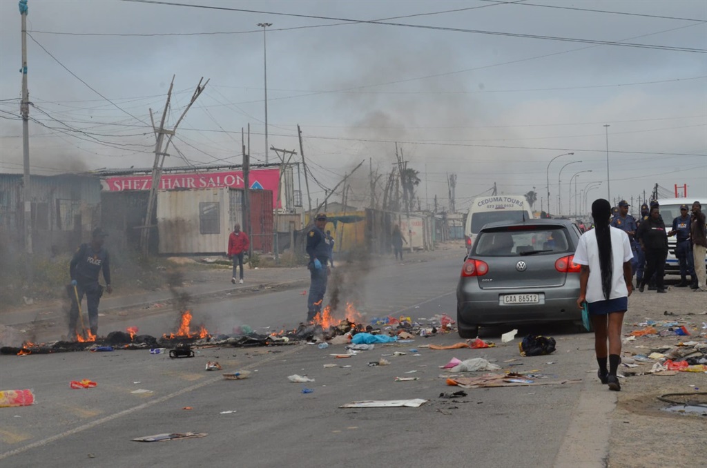 Gatvol residents through rubbish on the streets in