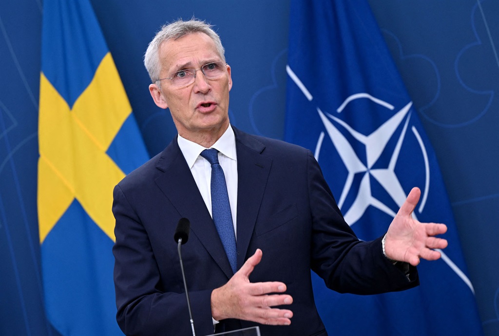 NATO Secretary General Jens Stoltenberg address a 