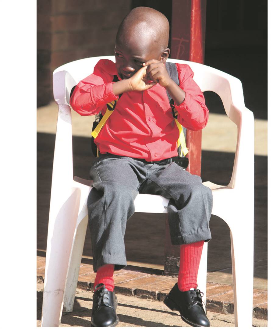 JOZI: Grade R pupil Siyabonga Mongayi couldn't hold back tears when his mum left him at Reagile Primary School in Tembisa          Photo by               Collen Mashaba
