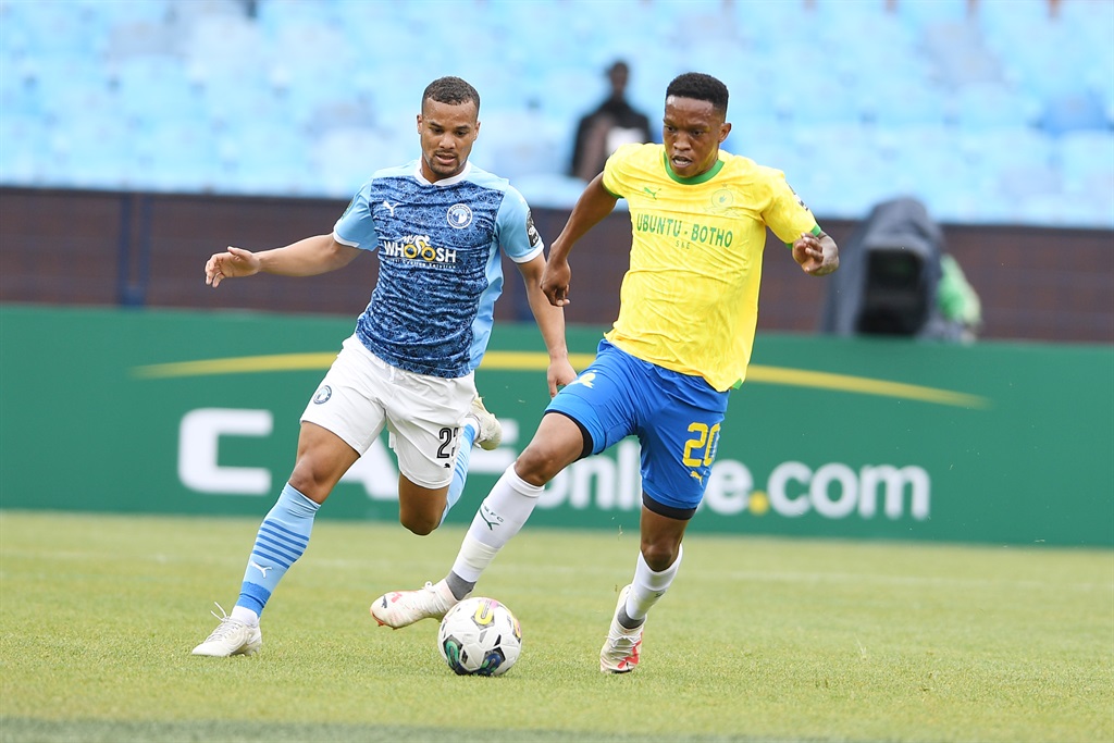 PRETORIA, SOUTH AFRICA - DECEMBER 10: Fagrie Lakay of Pyramids FC and Grant Kekana of Mamelodi Sundowns   during the CAF Champions League match between Mamelodi Sundowns and Pyramids FC at Loftus Versfeld on December 10, 2023 in Pretoria, South Africa. (Photo by Lefty Shivambu/Gallo Images)