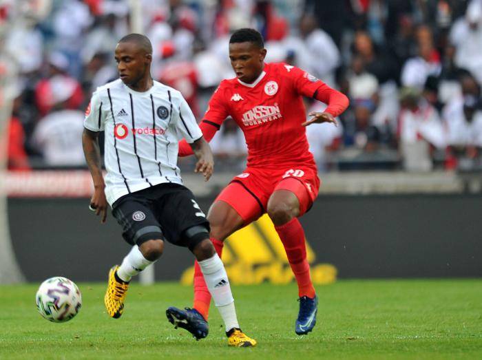 heading for a goal Orlando Pirates’ Thembinkosi Lorch drifts away from Lesenya Ramoraka of Highlands Park during their Absa Premiership fixture in Orlando, Soweto, last night PHOTO: BackpagePix