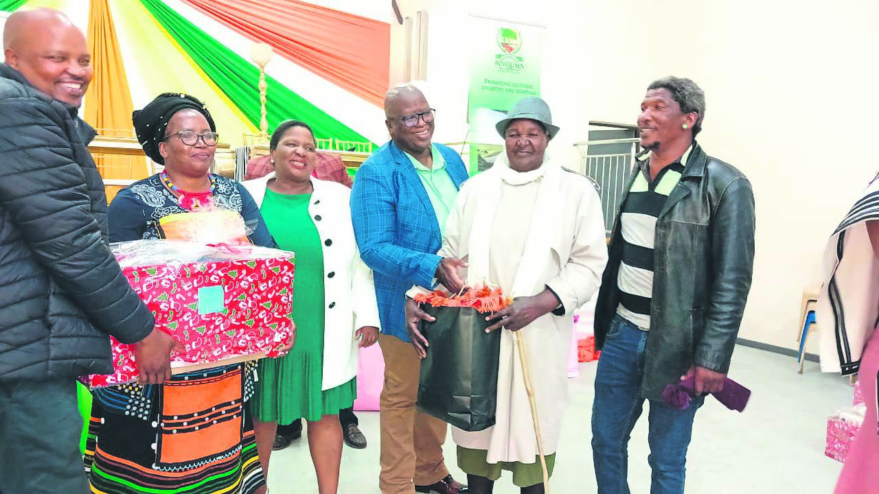 Elderly citizens of Mnquma Local Municipality receiving gifts during the Christmas lunch the local municipality hosted for them last week                            