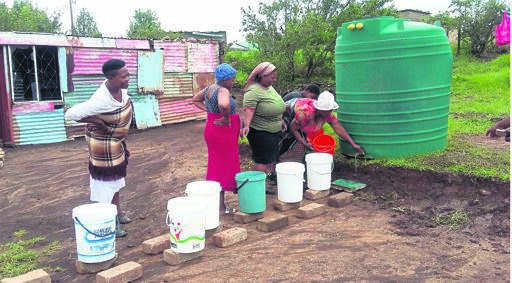 Single mum Phindile Mbele (inset) and her kids now have a Jojo water tank in their yard, thanks to Mboro.