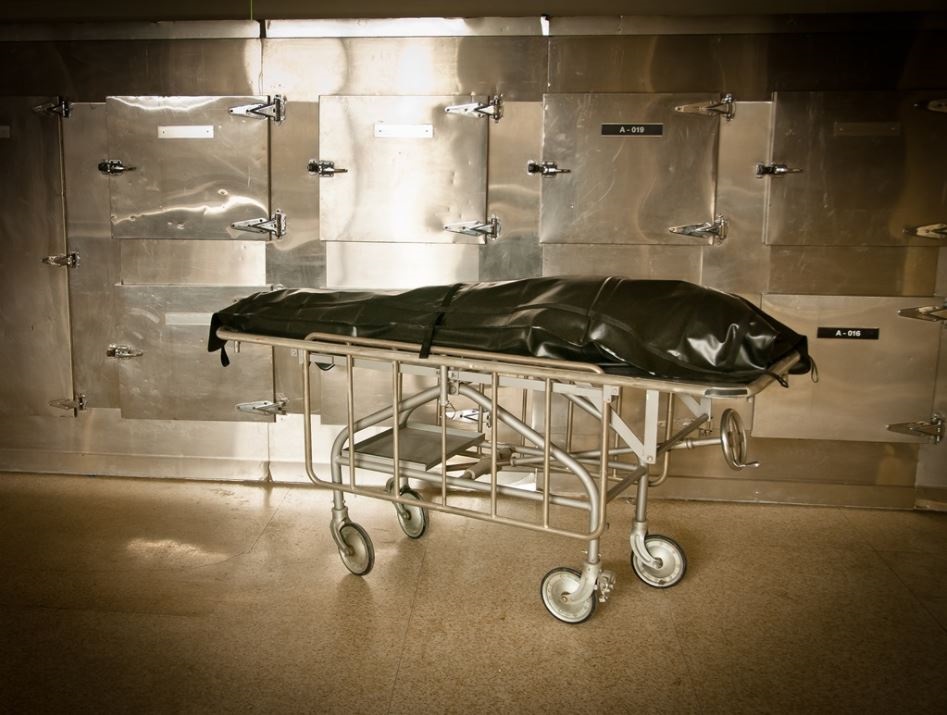 Body bag in a hospital morgue in black and white. (Image: Getty)
