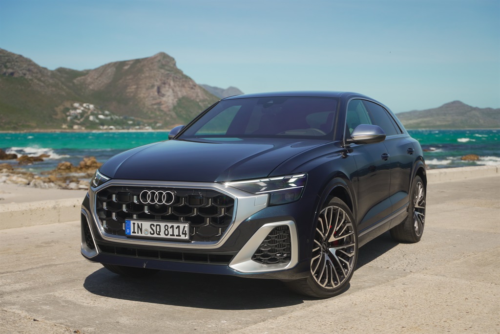 The new SQ8 wears its chrome grille like a mask.