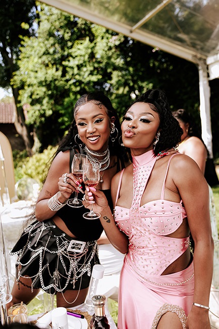 DJ Zinhle toasts her collab with luxury cognac bra