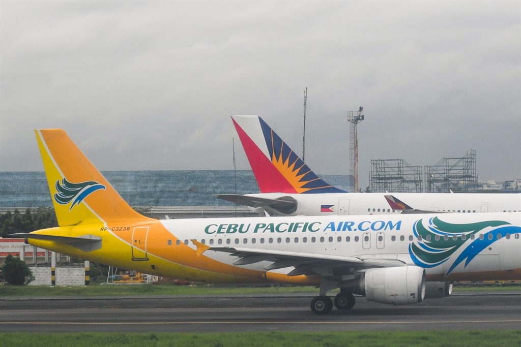 Planes belonging to Cebu Pacific and Philippine Ai