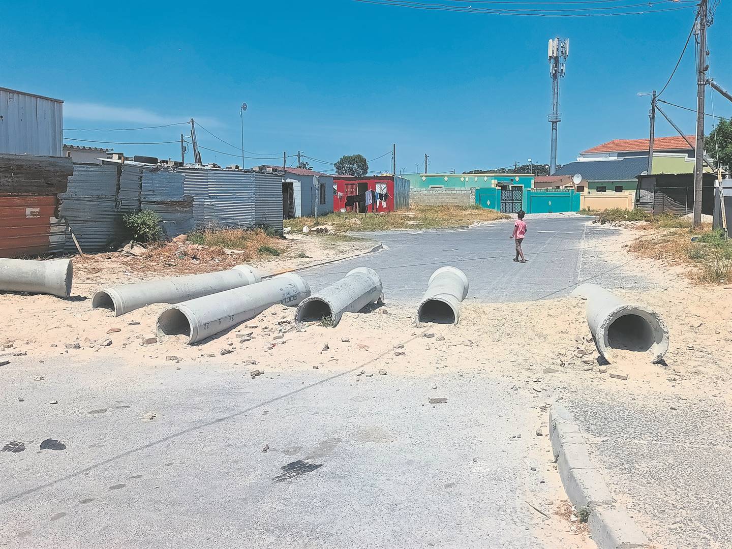 Ugwidi Street is barricaded with sand and pipes to fight crime.PHOTO: UNATHI OBOSE