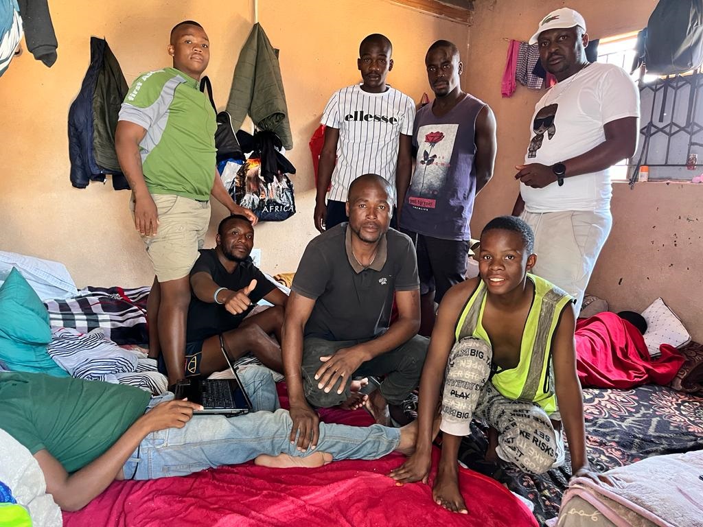 Kabelo Malatji (standing, right) with some of the addicts. 