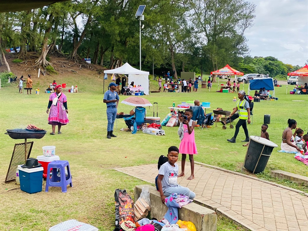 Visitors having fun with their families at the park. Photo by Xolile Nkosi