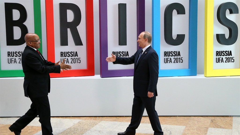 Former president Jacob Zuma greeting President Vladimir Putin during the BRICS 2015  Summit in Ufa, Russia. The writer chighlights several areas where it has gone wrong for BRICS ahead of the 2023 summit in SA. (Photo by Sasha Mordovets/Getty Images)