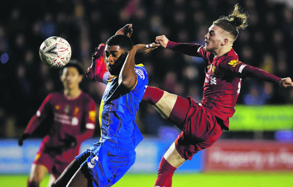 Ro-Shaun Williams of Shrewsbury Town has his head almost kicked in during a high tackle by Liverpool’s Harvey ElliotPHOTO: Richard Heathcote / Getty Images