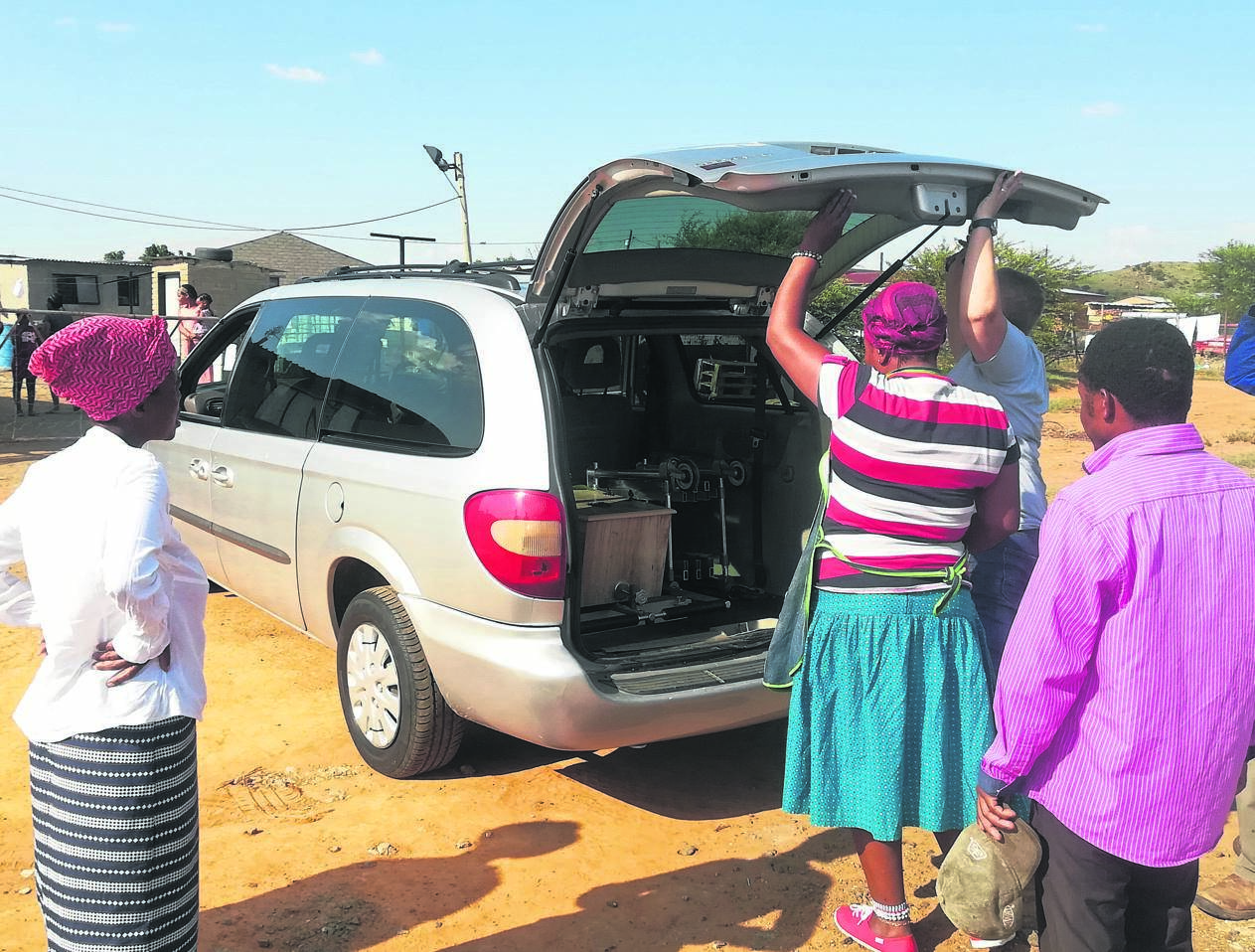The family wanted to drop off gogo Julia Khaile’s body at the mashonisa’s house. Inset: Gogo Julia was buried on Saturday.