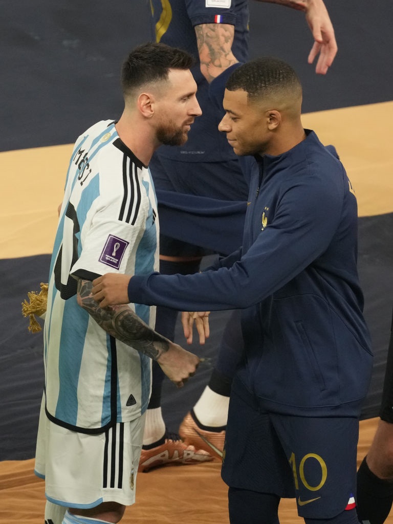 LUSAIL CITY, QATAR - DECEMBER 18: Lionel Messi of Argentina and Kylian Mbappe of France are seen prior to the FIFA World Cup Qatar 2022 Final match between Argentina and France at Lusail Stadium on December 18, 2022 in Lusail City, Qatar. (Photo by Etsuo Hara/Getty Images)