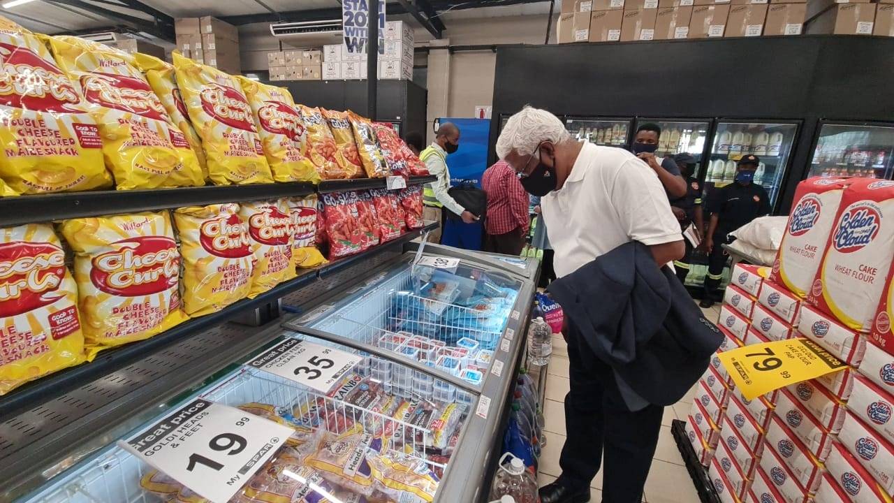 MEC Ravi Pillay checks the frozen section in a supermarket.