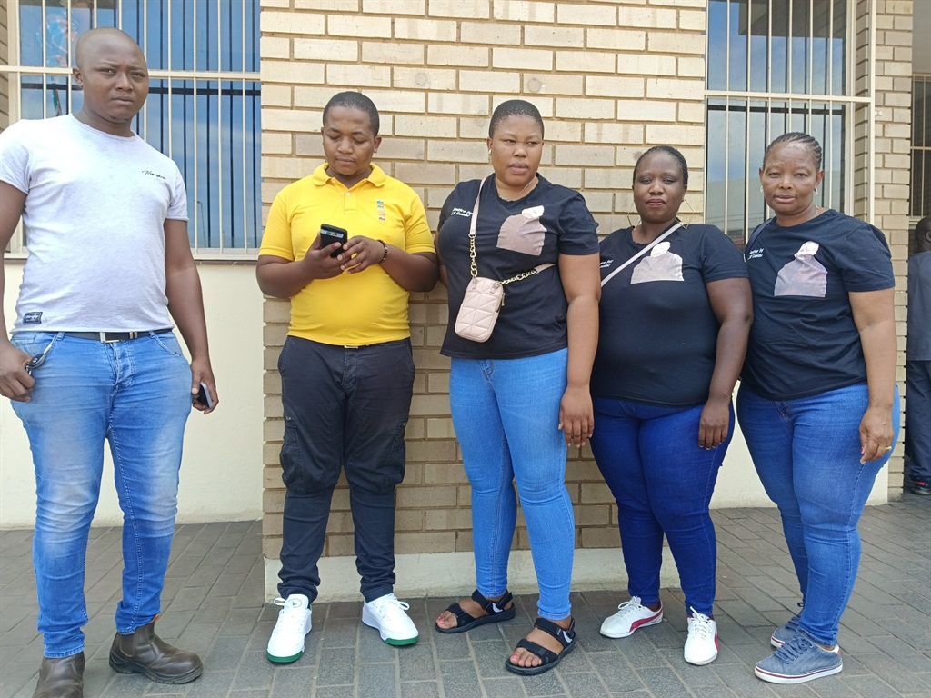 From left: Siyabonga Maduna, Ntokozo Gumbi, Pontsho Motaung, Lerato Pine and Fikile Mahupela outside the Rustenburg Magistrates Court on Monday. Photo by Rapula Mancai