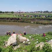  River cleansing claims two lives 