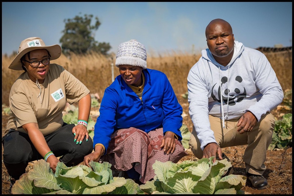 WWF-SA's Ayanda Cele with women farmers from the U