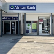 African Bank's profit slumps almost a third as bad debts double