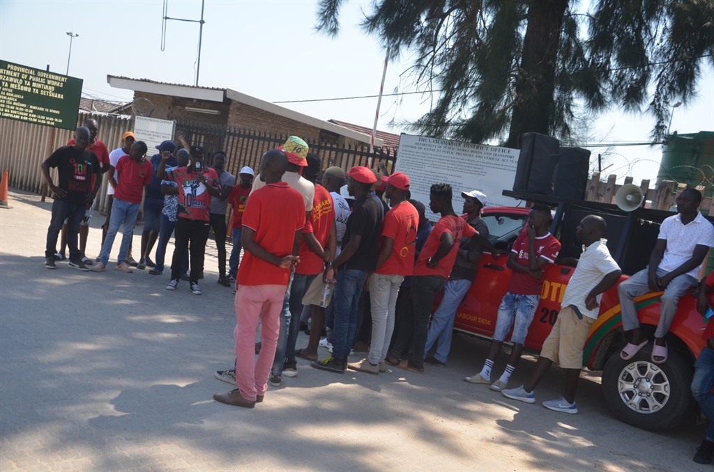 EFF and community members protesting outside the P