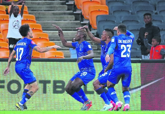 Daylon Claasen of Maritzburg United celebrates scoring a goal with his team-mates during their Absa Premiership match against Kaizer Chiefs last night. Picture: Samuel Shivambu / BackpagePix