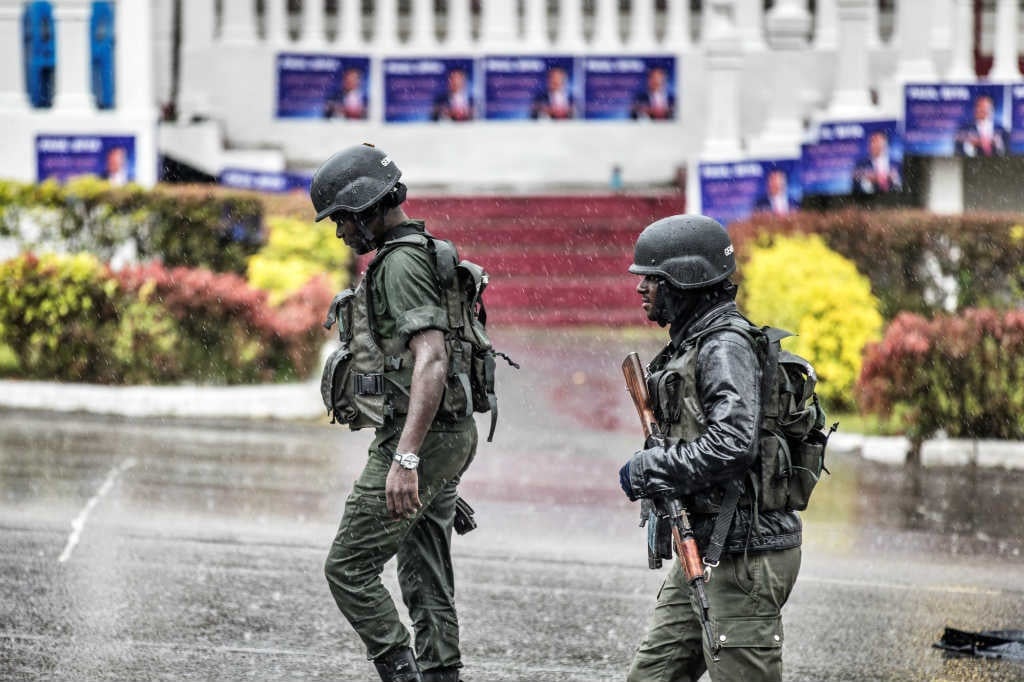 Members of the Cameroonian Gendarmerie patrols in the Omar Bongo Square of Cameroon's majority anglophone South West province capital Buea on October 3, 2018.