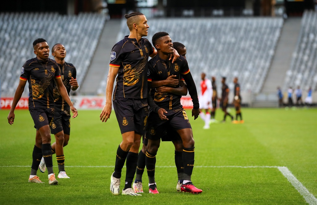 CAPE TOWN, SOUTH AFRICA - NOVEMBER 25: Menzi Masuku of Royal AM FC celebrates his goal with his team mates during the DStv Premiership match between Cape Town Spurs and Royal AM at DHL Cape Town Stadium on November 25, 2023 in Cape Town, South Africa. (Photo by Roger Sedres/Gallo Images)