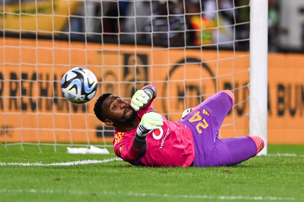 DURBAN, SOUTH AFRICA - OCTOBER 07: Sipho Chaine of Orlando Pirates makes his second save in the penalty shootout during the MTN8 final match between Orlando Pirates and Mamelodi Sundowns at Moses Mabhida Stadium on October 07, 2023 in Durban, South Africa. (Photo by Darren Stewart/Gallo Images),?